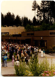 People outside during graduation