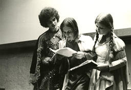 Three people in costume
