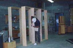 Students building cupboards