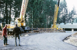 Crane preparing portable foundation