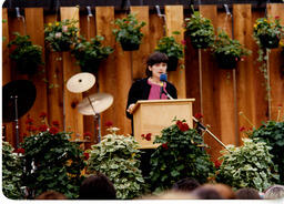 Woman speaking at graduation