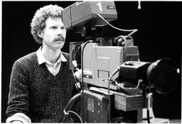 Man filming with movie camera