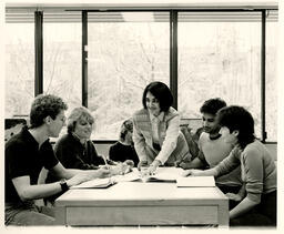 Students around a desk