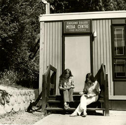 Two students in front of Capilano College Media Centre: 