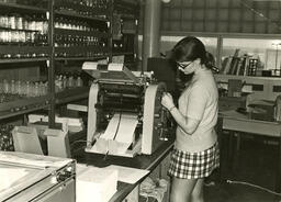 Woman at a machine