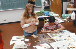 Two ECE students work with children