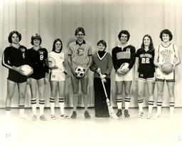 Students showing off team uniforms