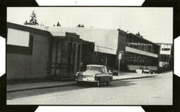 Car in front of building