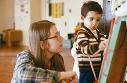 ECE Student with child